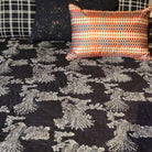 Birds of Paradise block-print quilt, silver birds on black cotton voile