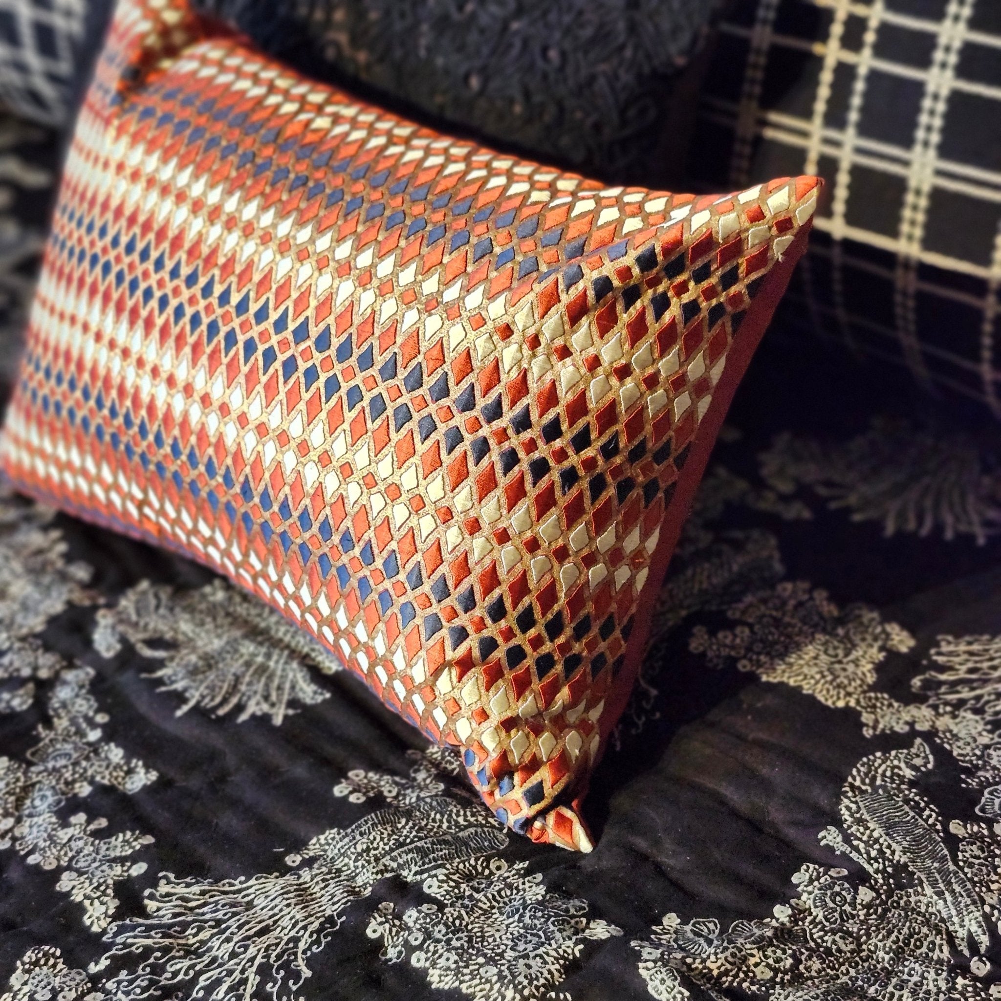 Red and gold diamond embroidered cushion detail, block-printed and hand-embroidered, Rasa Jaipur
