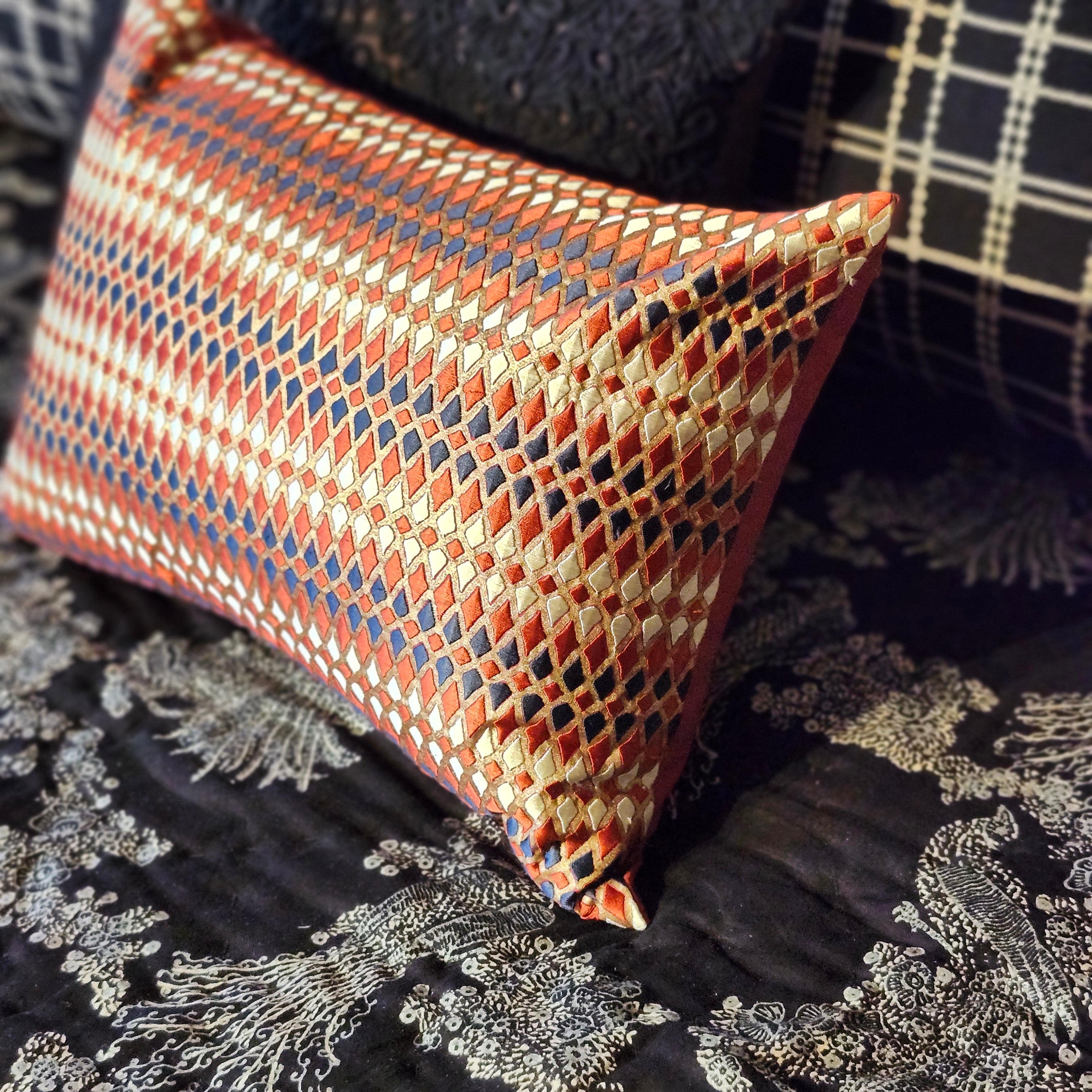Red and gold diamond embroidered cushion detail, block-printed and hand-embroidered, Rasa Jaipur