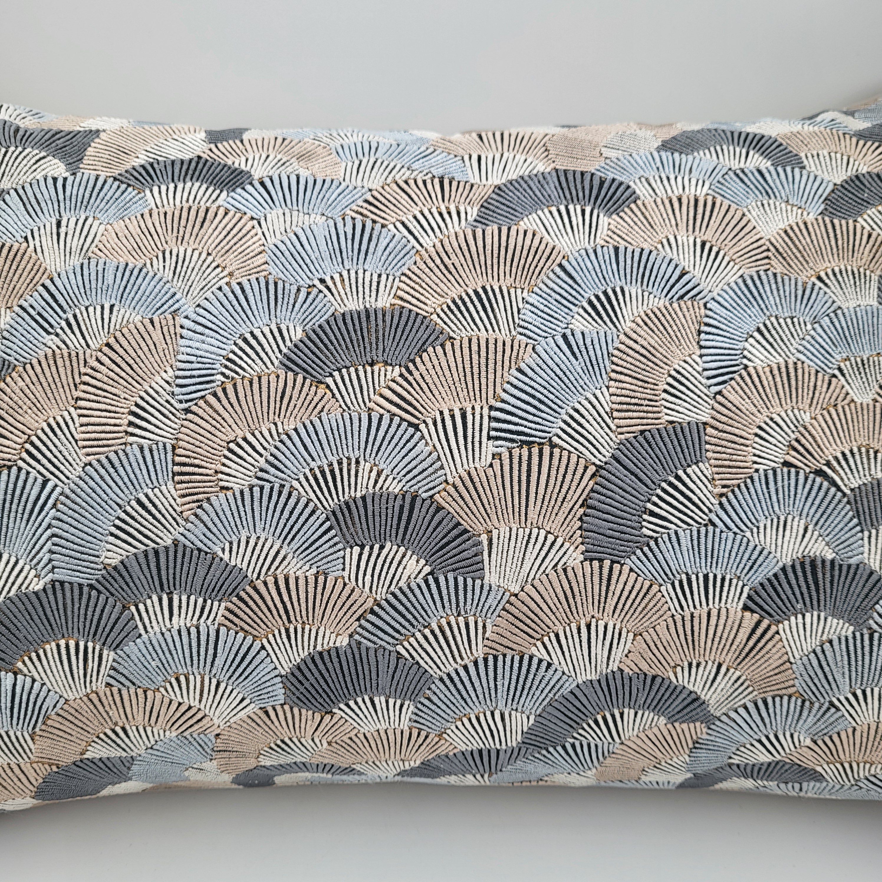 Fans embroidered cushion in black with grey and taupe hand-embroidery, 30 x 46 cm, styled