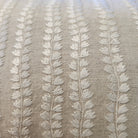 Natural Beige embroidered cushion detail showing white floral embroidery on cotton linen, 30 x 46 cm