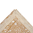 Yellow rainforest block-print cotton tablecloth with a striped border