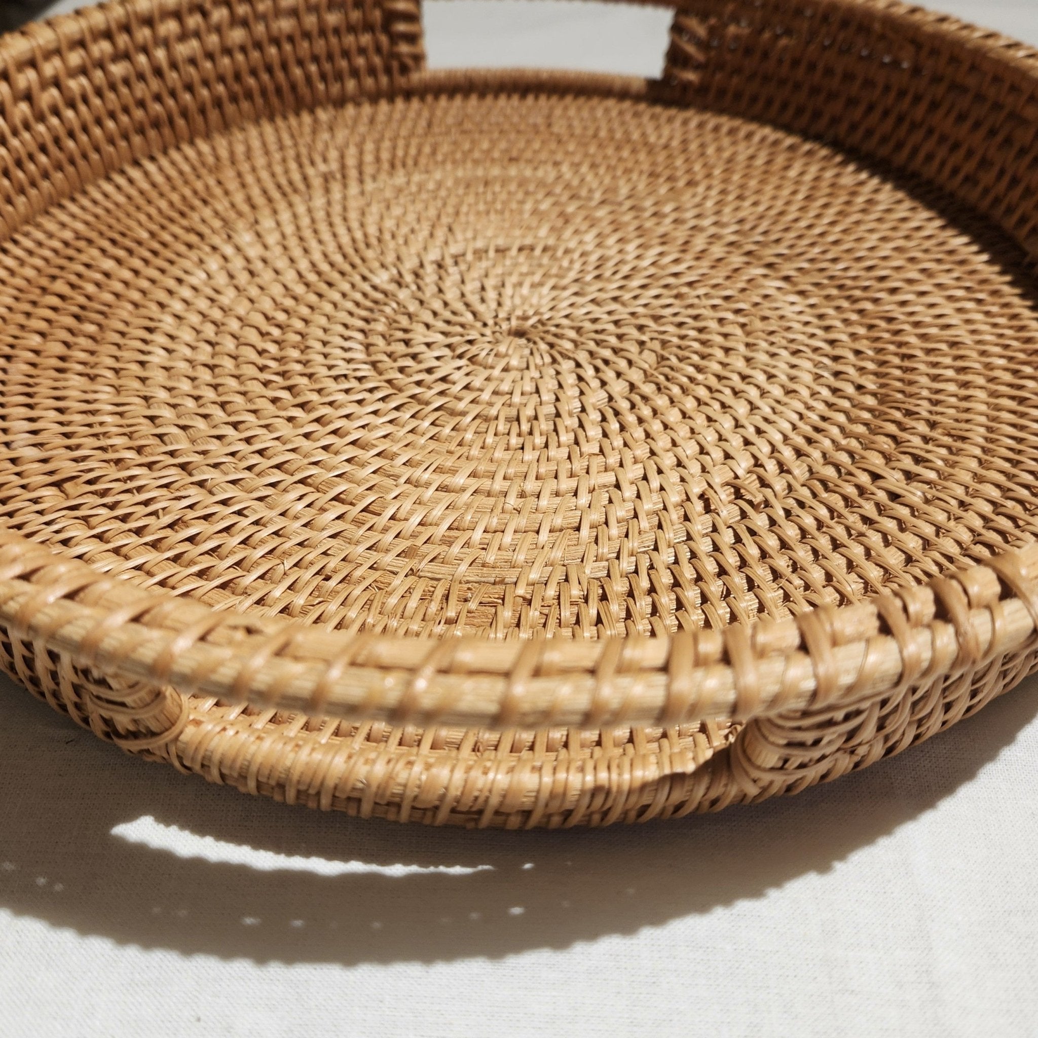 Round finely woven rattan tray, natural rattan, for serving or display