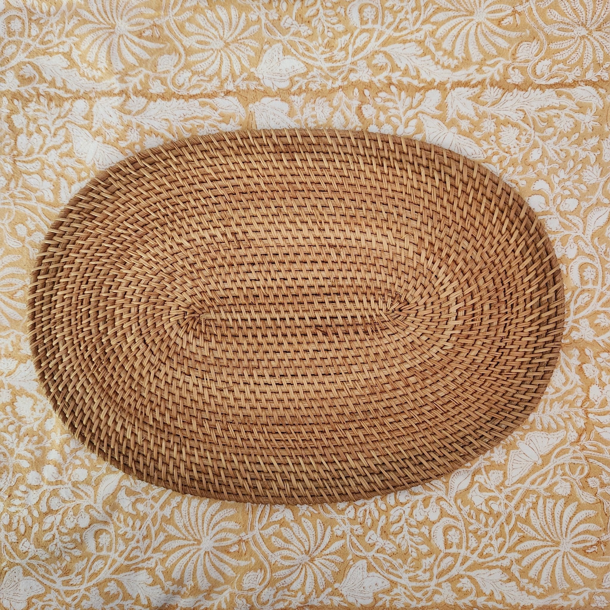 Oval rattan placemat, small, 25 x 35 cm, handwoven