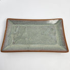 Rectangular ceramic dish in jade with polished glaze, 19 x 11.2 cm