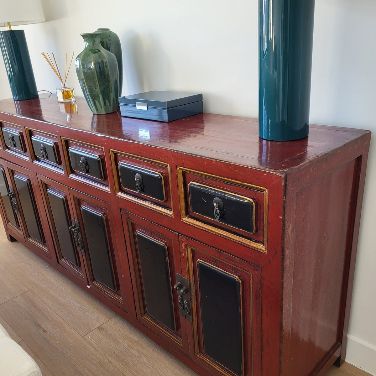 Red lacquer vintage Chinese sideboard, fitted with six doors and six drawers, giving plenty of storage behind a red finish