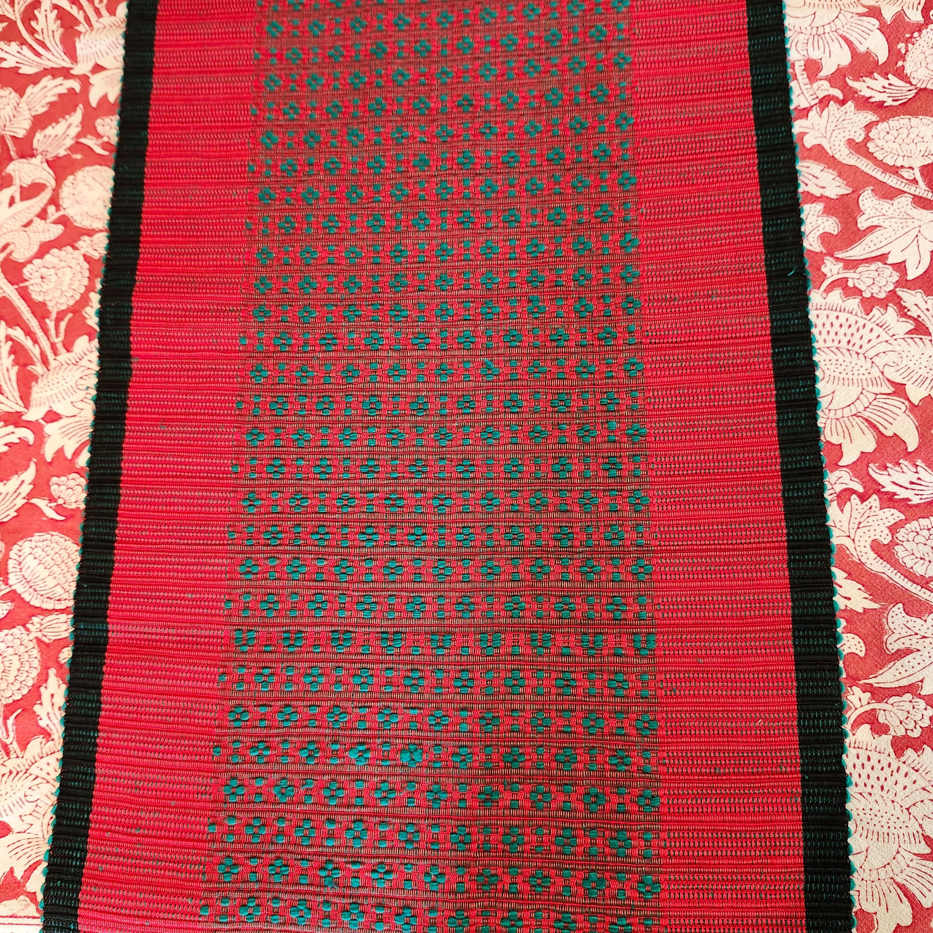 Handwoven festive table runner in red cotton, handloom woven