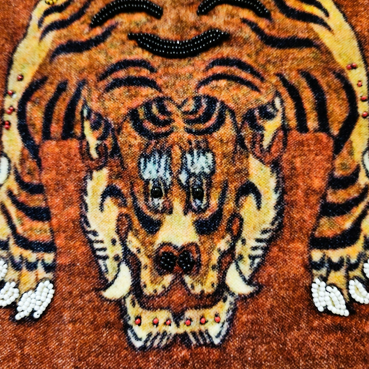 Reverse of the tiger cushion cover, backed in a tiger stripe cotton, with the filler sold separately.