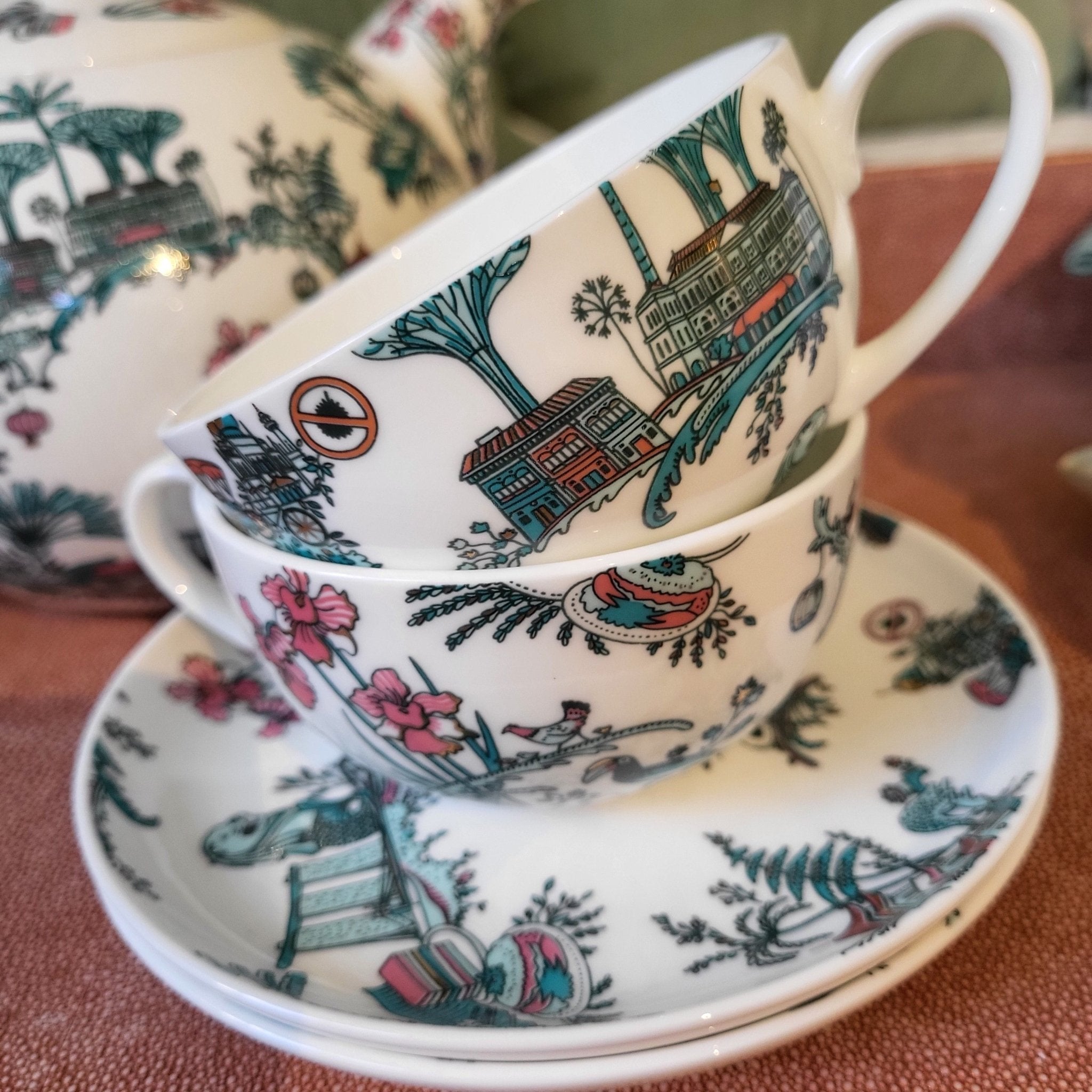 Singapore Toile cup and saucer, fine bone china, green, pink and gold toile design