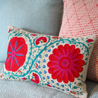 Suzani Fergana linen cushion in turquoise, pink and red, hand embroidered, 45 x 30cm