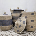 Blue-detail seagrass laundry baskets with lids and handles, multiple sizes, handwoven