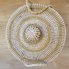 Small white seagrass lidded basket, woven seagrass, side view