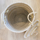 Small white seagrass laundry basket with lid, detail