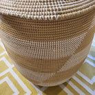 White-detail seagrass laundry basket with lid, woven detail