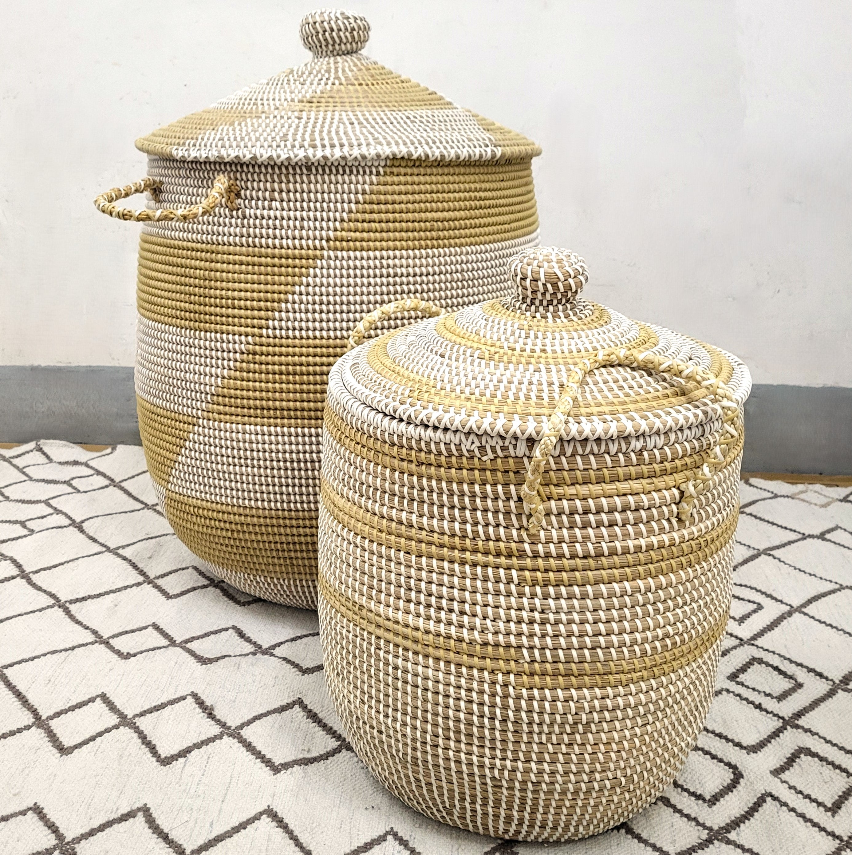 White-detail seagrass laundry baskets with lids and handles, three sizes, handwoven
