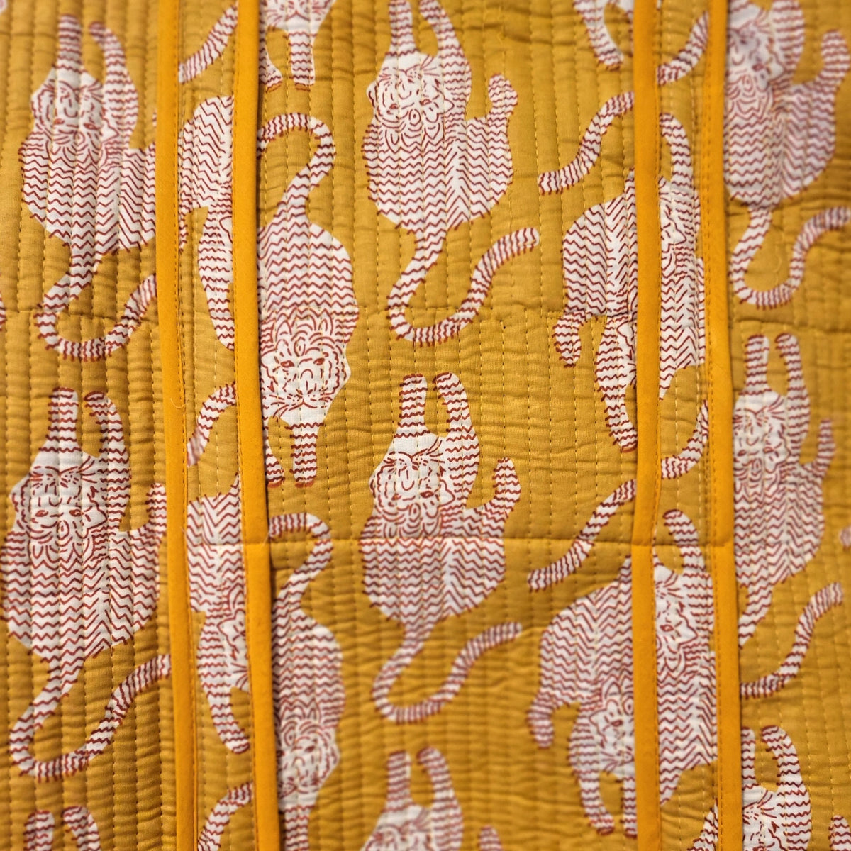 Tiger block-print shopper bag in red and yellow, quilted cotton with contrast lining and interior pocket