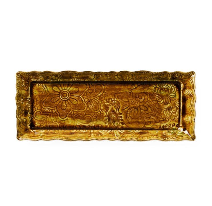 A large ceramic appetizer plate or tray from Sthal, with intricate patterns in their pineapple colour