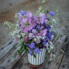 Putty Salon high ribbed vase, fluted terracotta, styled with flowers