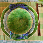 Sthal soup bowl seaweed sitting on a bamboo placemat in lime