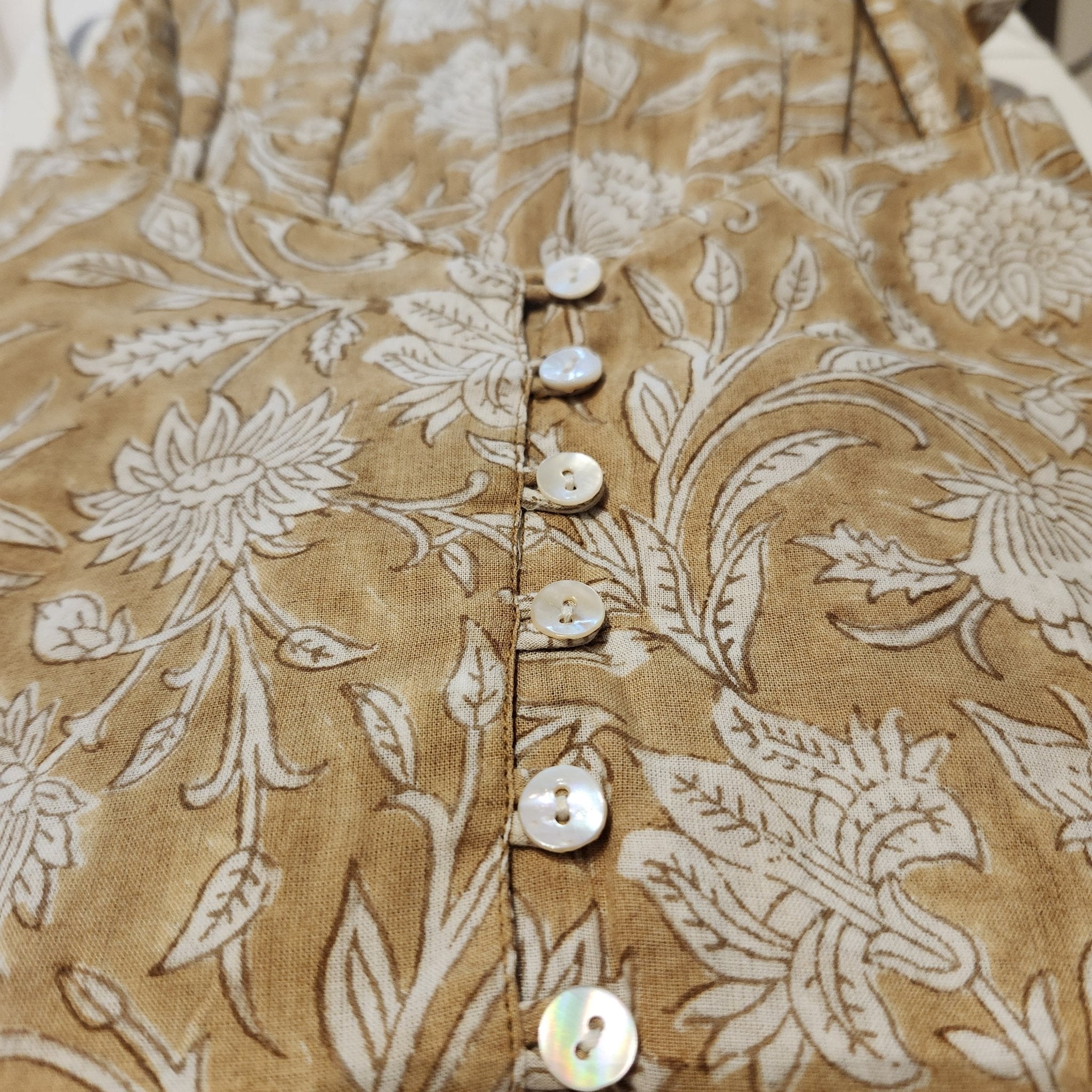 Handmade block-print cotton sundress in a mustard floral pattern, available in one size