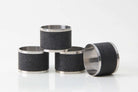 Caviar black faux shagreen napkin rings by Forwood Design, set of 4, styled on a dinner table