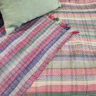 Vintage kantha quilt, folded, faded tones