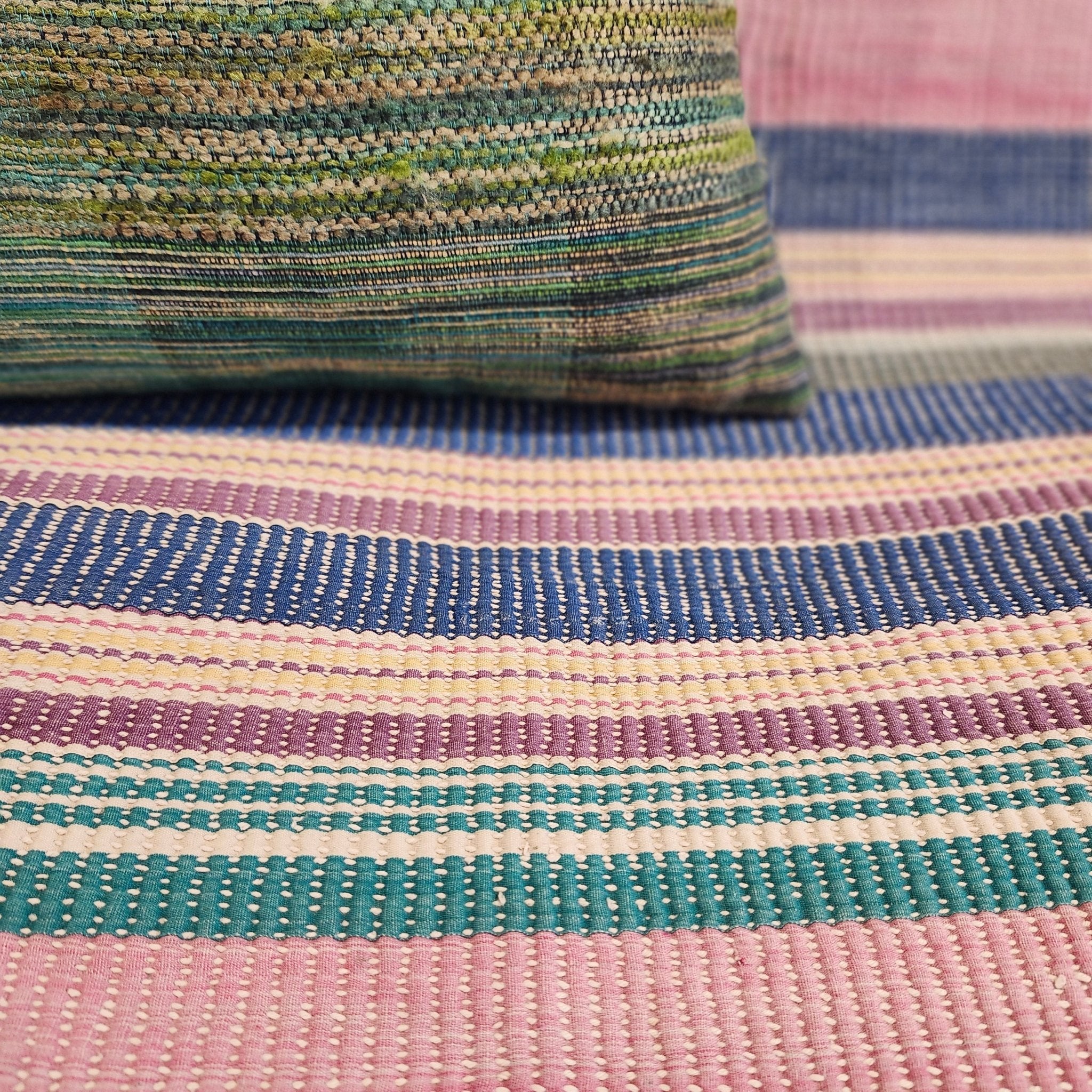 Pastel striped vintage kantha quilt, hand-stitched, styled