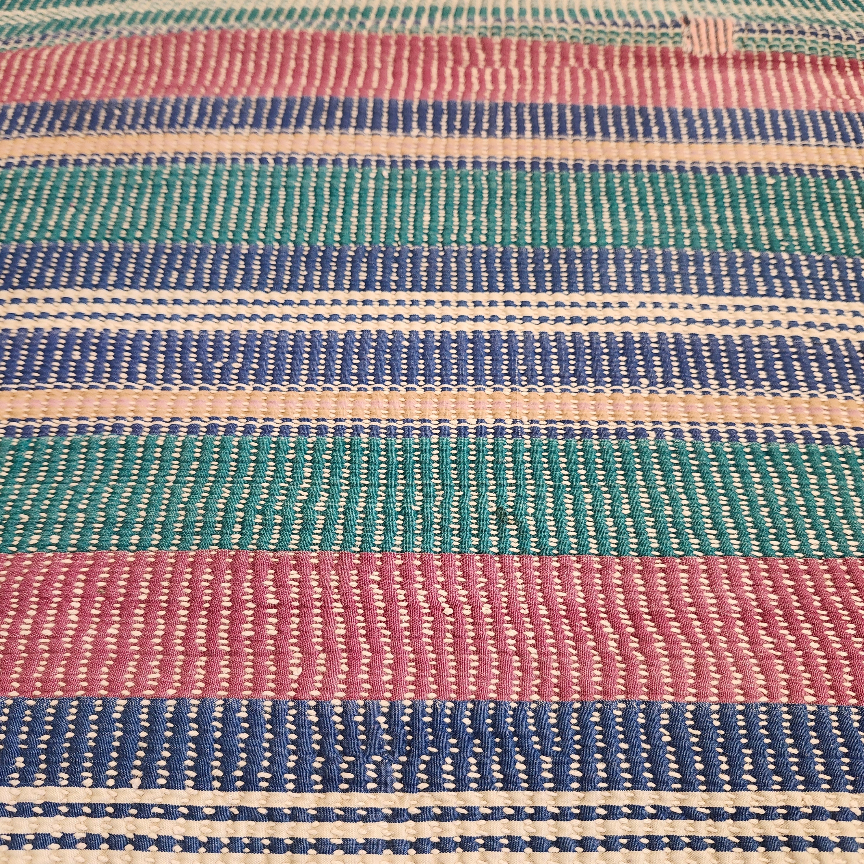 Pastel striped vintage kantha quilt, reverse side