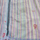 Green, pink and yellow vintage kantha quilt, stitch detail