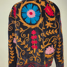 Black suzani velvet jacket, hand-worked stitching, styled