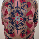 Bronze suzani velvet jacket, contrast paisley lining, styled