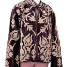 Plum velvet jacket with hand-worked suzani stitching, contrast lining