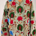 Mint velvet jacket with suzani stitching, green striped cotton lining