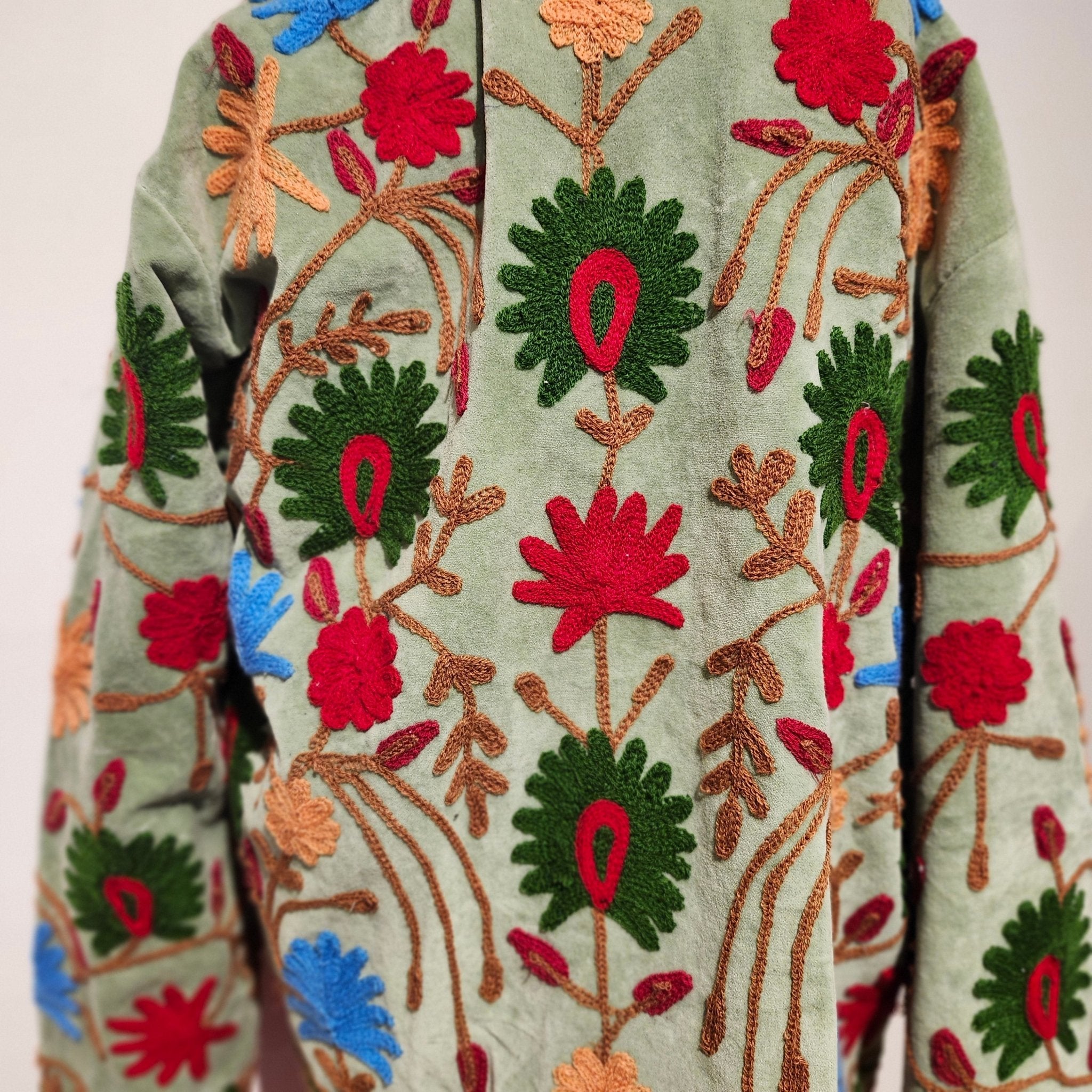 Mint velvet jacket with suzani stitching, green striped cotton lining