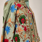 Mint suzani velvet jacket, hand-worked stitching, styled
