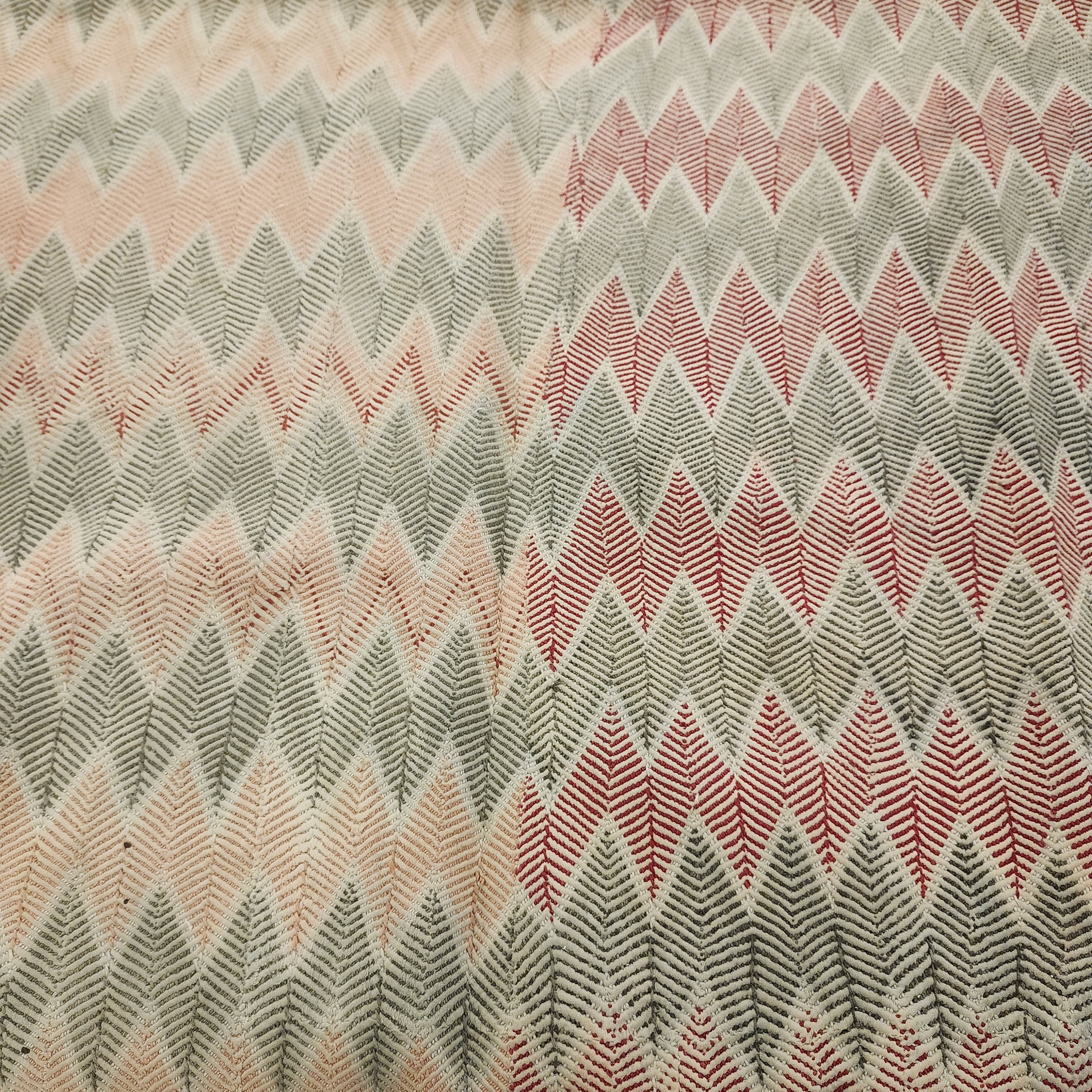 Faded zigzag vintage kantha quilt, folded