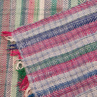 Faded vintage kantha quilt, hand-stitched, styled
