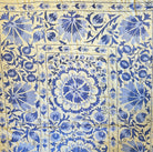 Vintage Suzani in blue on cream background