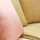 Coral diamond-pattern cushion by Weaver Green, recycled yarn, 45 cm