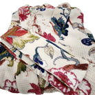 Cream waffle dressing gown block printed with tropical flowers, lightweight cotton that dries quickly