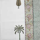 Cotton waffle bath towel with a cypress and palm block print, 73 by 155 cm, light and very absorbent