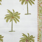 Palm print cotton waffle bath towel, 73 by 155 cm, lightweight with an all over block printed pattern