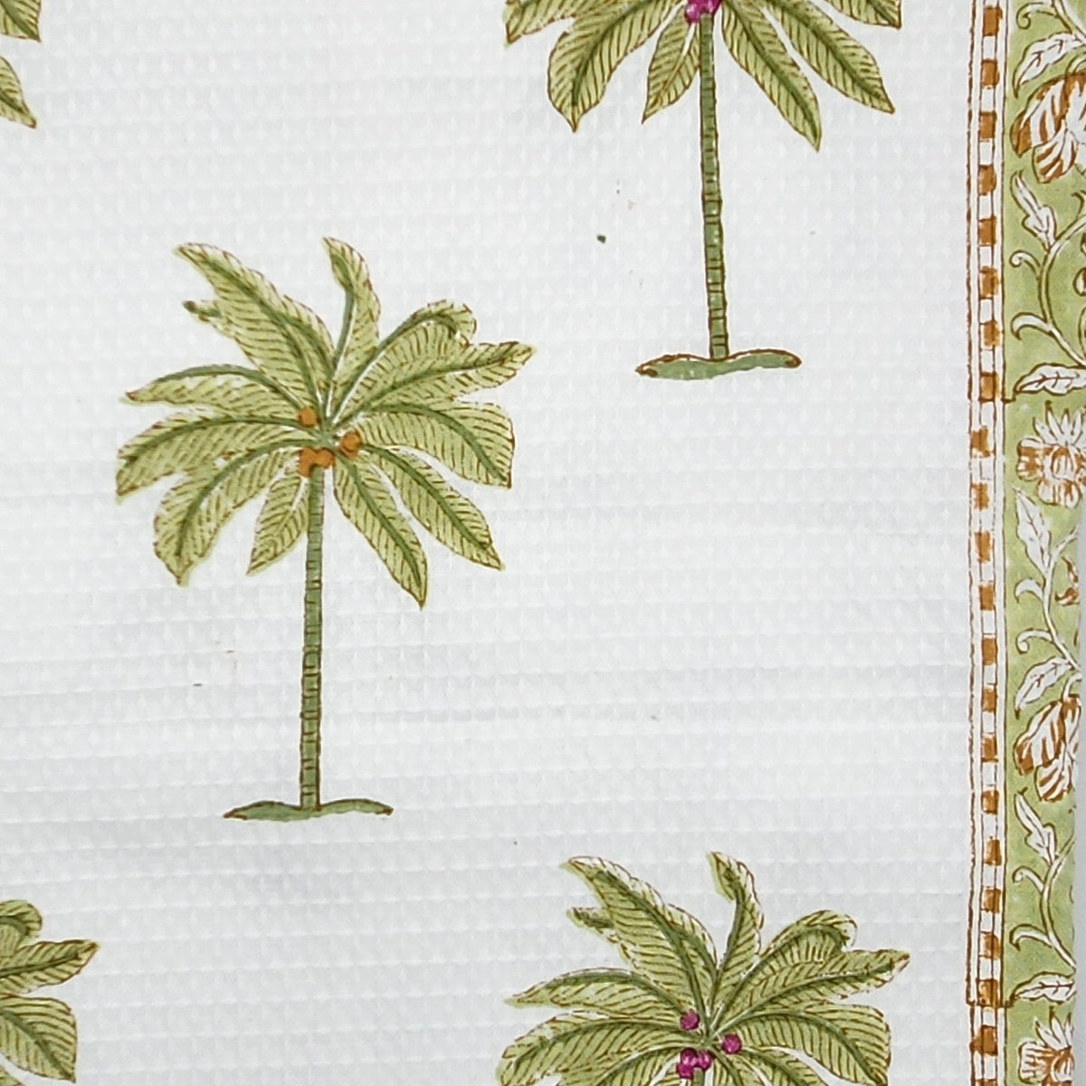 Palm print cotton waffle bath towel, 73 by 155 cm, lightweight with an all over block printed pattern