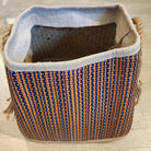 Small wicker basket with a dark stripe and rope handles, 28cm high and 22cm wide, handcrafted from lightweight wicker
