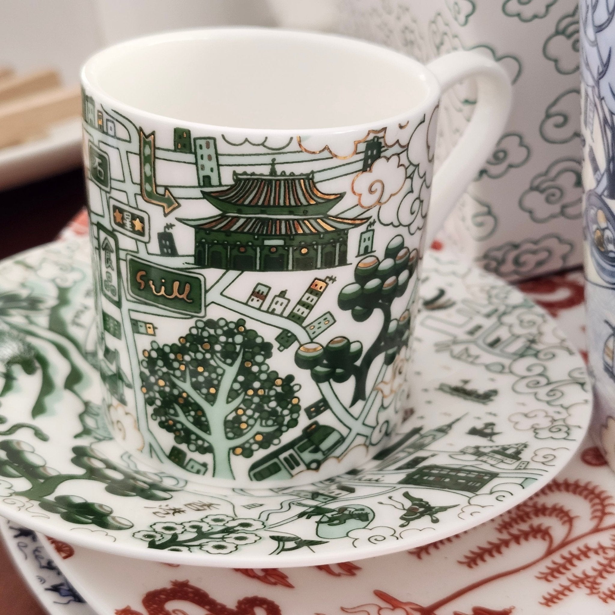 Willow pattern espresso cups and saucers in green and gold, set of two, ceramic