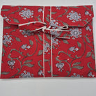 Floral block-print short pyjamas with lilac flowers on a red background