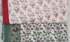 Block-print cotton tablecloth in an assorted floral print, 180 x 350 cm
