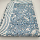 Sky blue rainforest block-print cotton tablecloth with a striped border