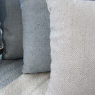 Weaver Green Capri diamond cushion in recycled plastic-bottle yarn
