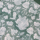 Classic teal floral block-print cotton tablecloth on white